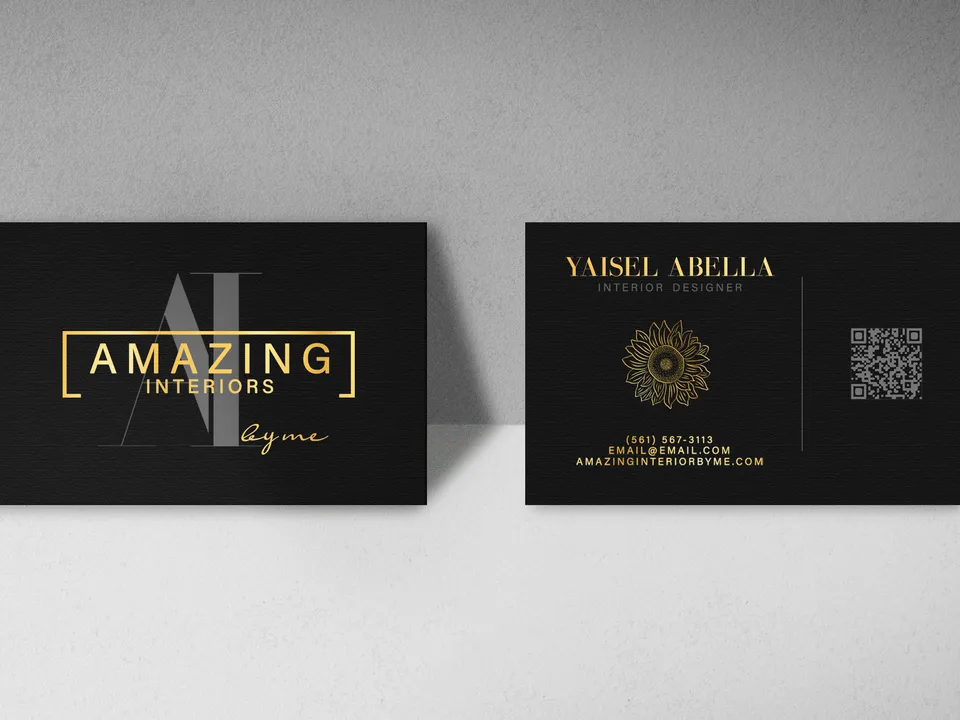 Black Amazing Interiors business cards with gold lettering