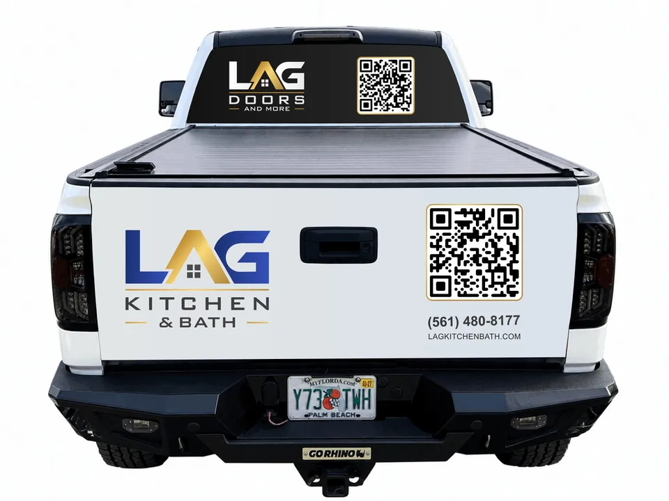 Pickup truck tailgate and window with LAG logos and QR codes